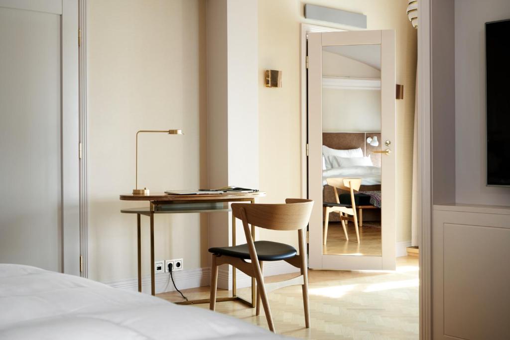 Postel nebo postele na pokoji v ubytování Hotel St. George Helsinki