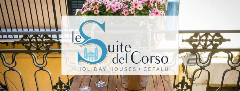 チェファルにあるLe suite del corsoの鉢植え窓の看板