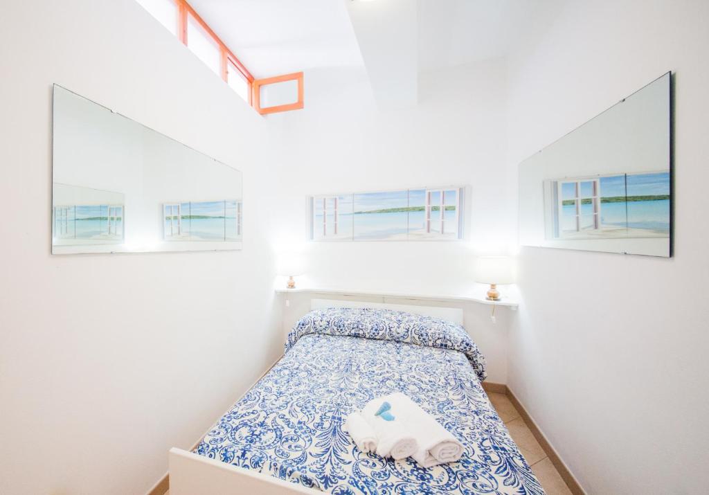 Postel nebo postele na pokoji v ubytování Mistral Residence