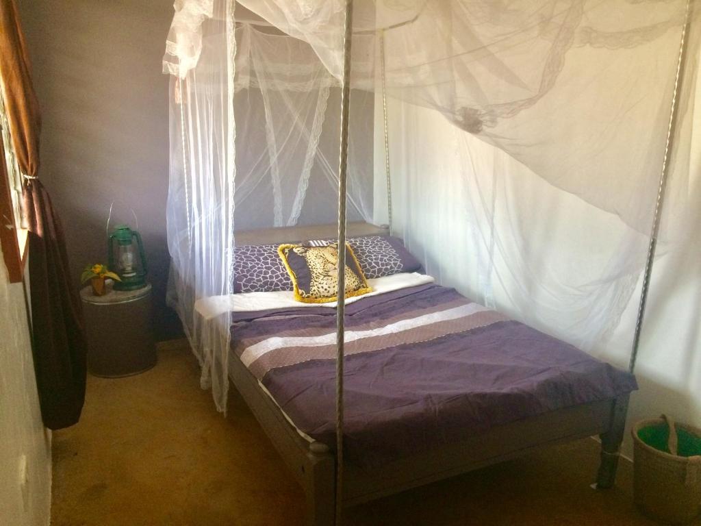 Postel nebo postele na pokoji v ubytování Amboseli Eco Camp