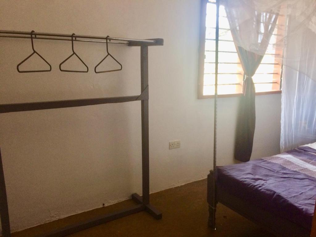 Postel nebo postele na pokoji v ubytování Amboseli Eco Camp