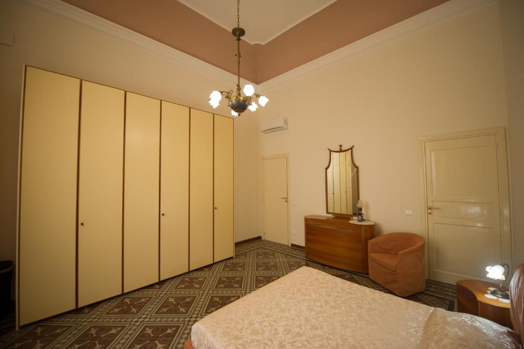 Łóżko lub łóżka w pokoju w obiekcie Villa le Torri B&B
