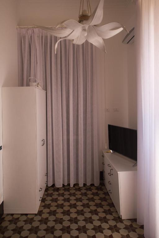 Telewizja i/lub zestaw kina domowego w obiekcie Villa le Torri B&B