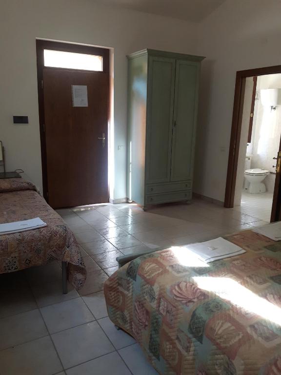 Postel nebo postele na pokoji v ubytování Agriturismo La Selva