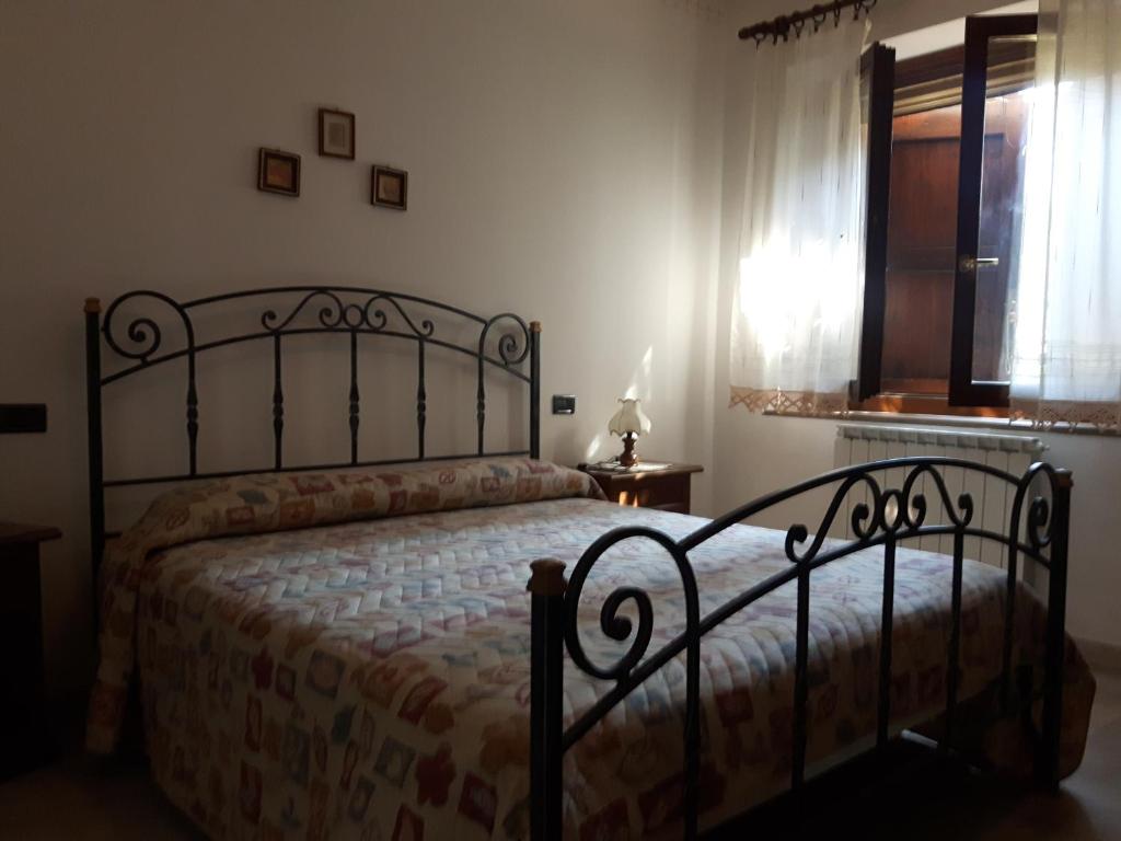 Postel nebo postele na pokoji v ubytování Agriturismo La Selva