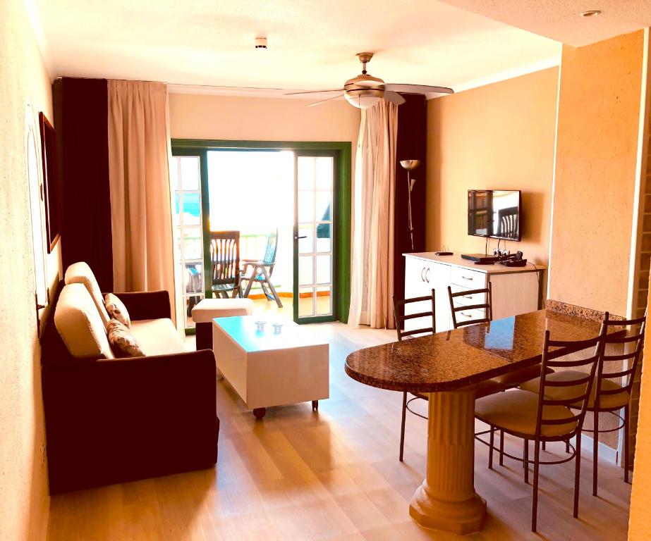 Posezení v ubytování Regency Torviscas Apartments and Suites