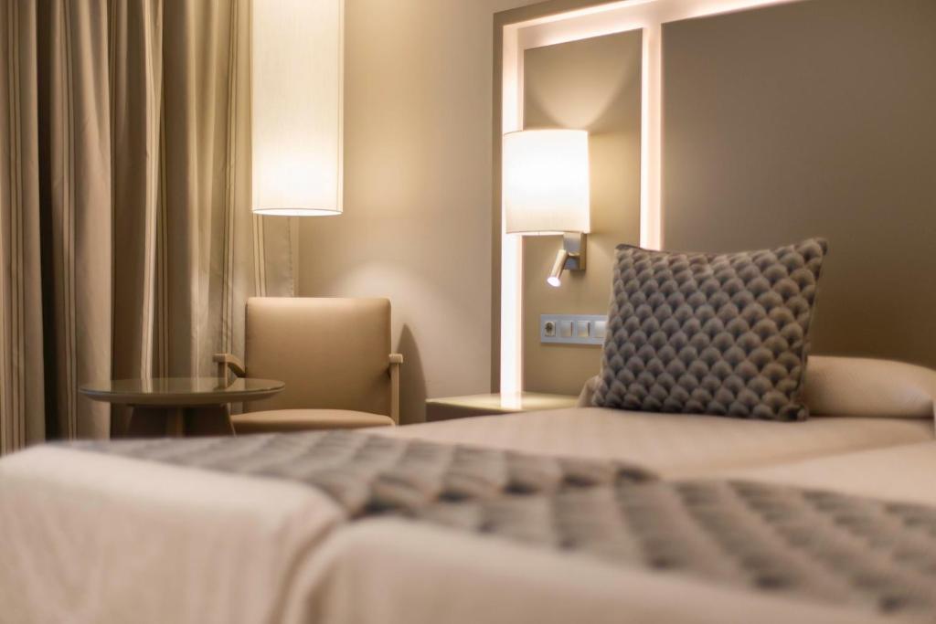 Postel nebo postele na pokoji v ubytování Spring Hotel Vulcano