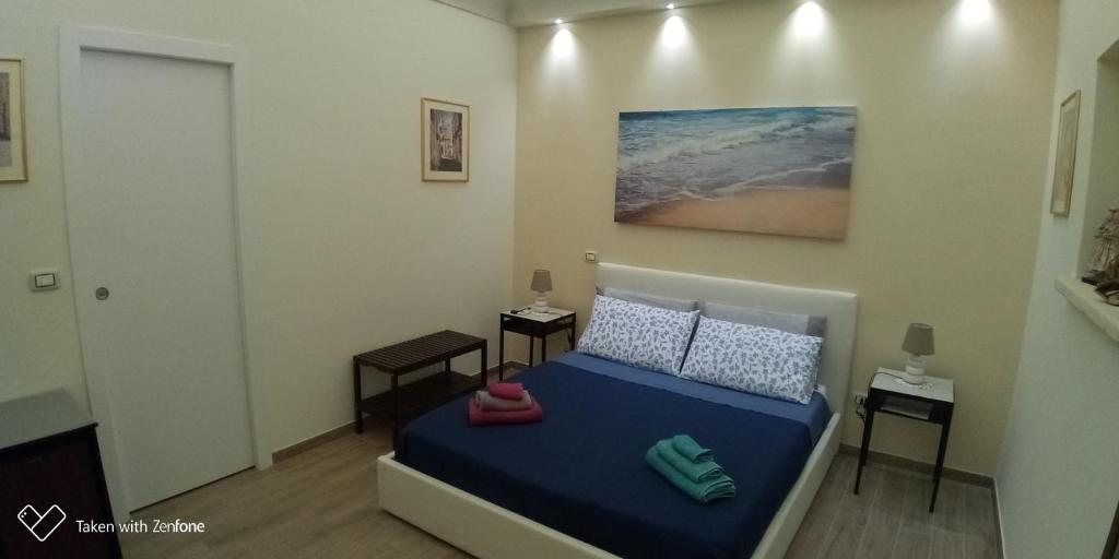 Postel nebo postele na pokoji v ubytování B&B Excelsior