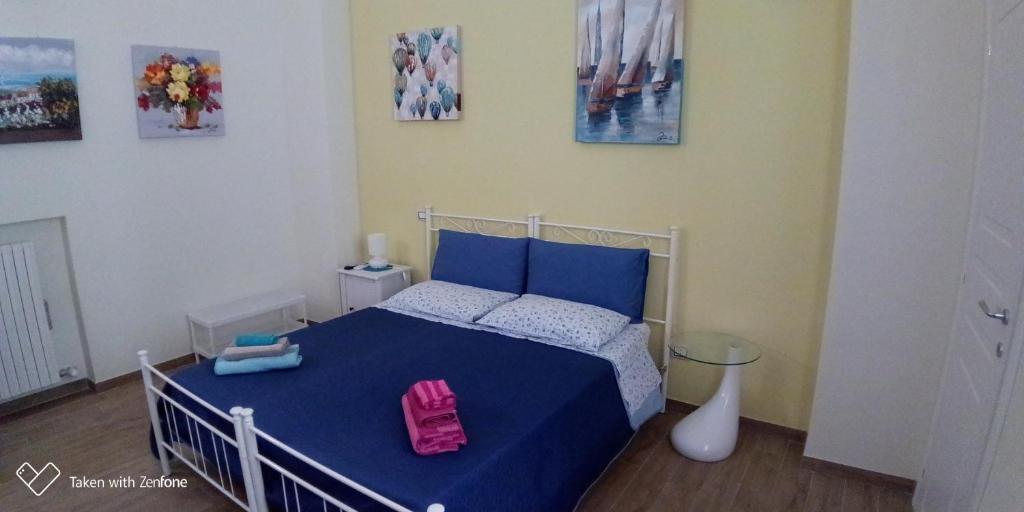 Postel nebo postele na pokoji v ubytování B&B Excelsior
