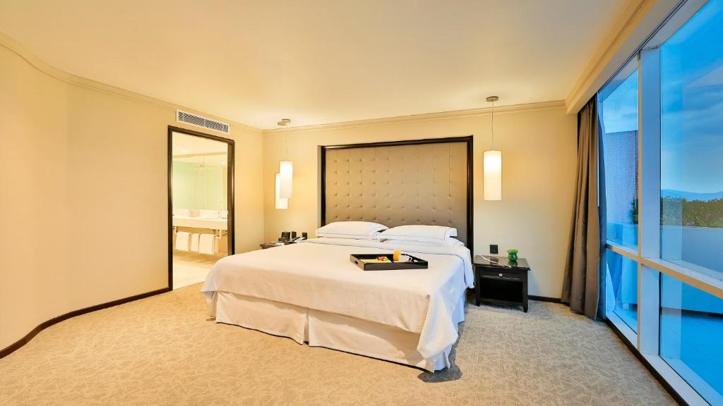 Кровать или кровати в номере Barceló Mexico Reforma