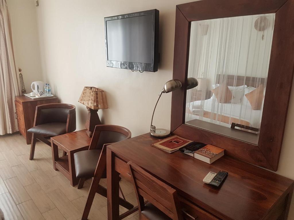 TV a/nebo společenská místnost v ubytování The Vic Hotel