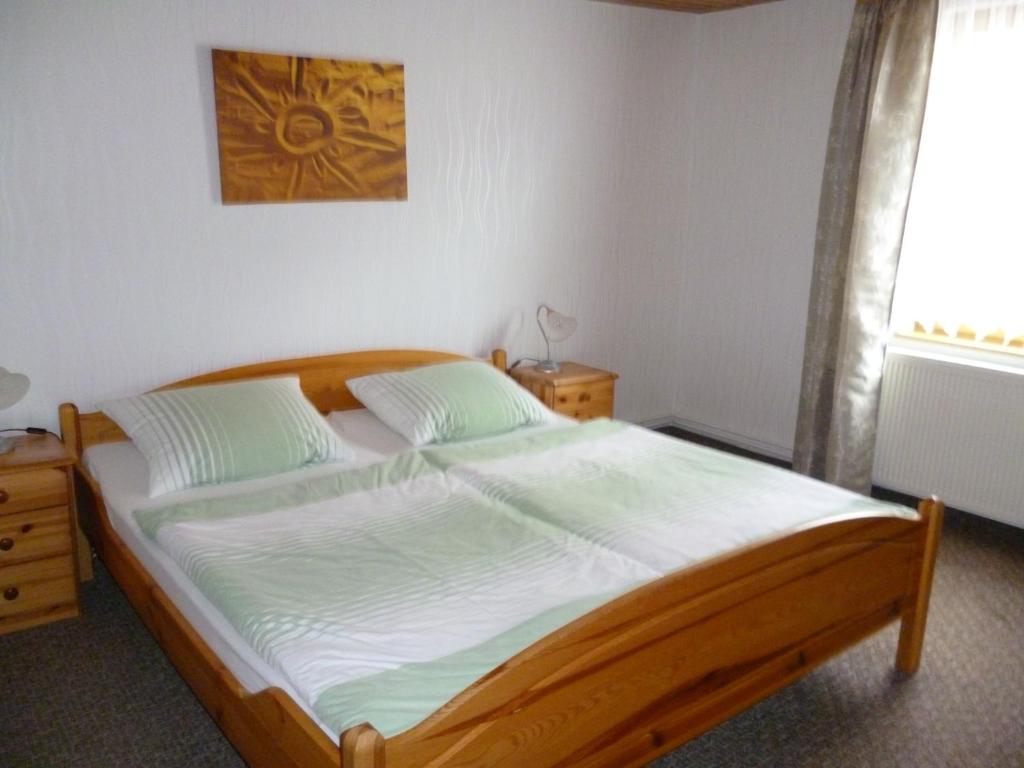 Postel nebo postele na pokoji v ubytování Haus Frohsinn