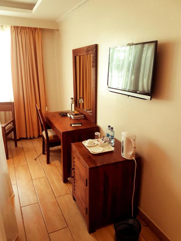 TV a/nebo společenská místnost v ubytování The Vic Hotel