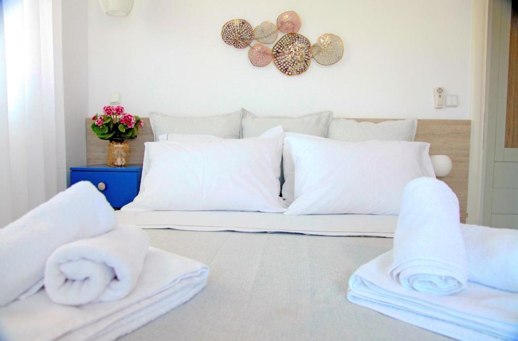 Postel nebo postele na pokoji v ubytování Paliouri Sea Lounge by Luxlikehome