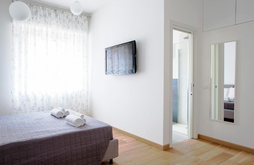 Postel nebo postele na pokoji v ubytování B&B agli Orti