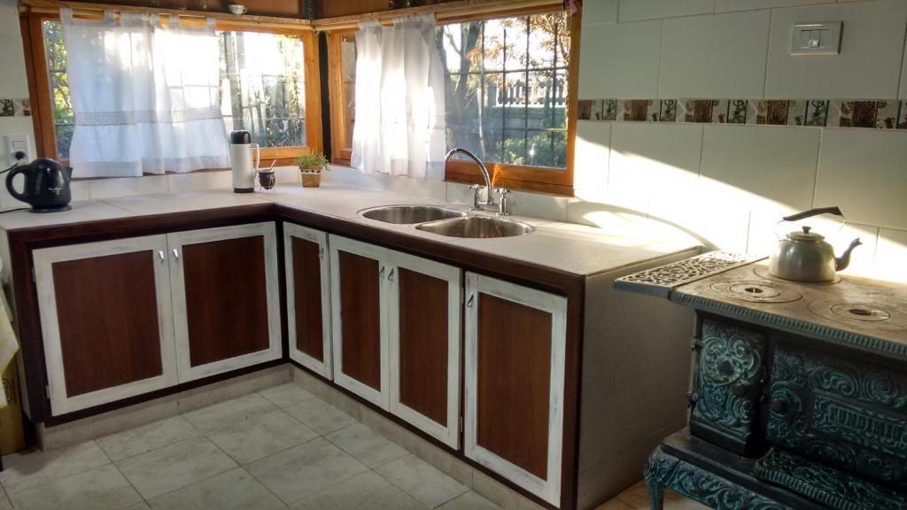 Kuchyň nebo kuchyňský kout v ubytování La casa de Hostal del Sol