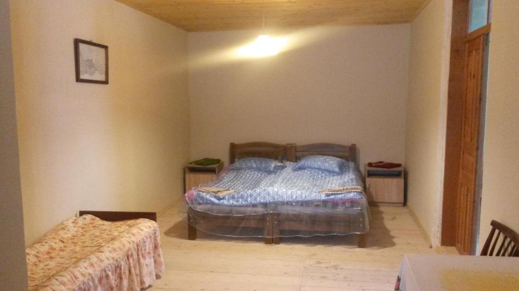 Postel nebo postele na pokoji v ubytování Ushba