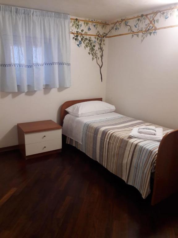 A bed or beds in a room at Casa de Spuches