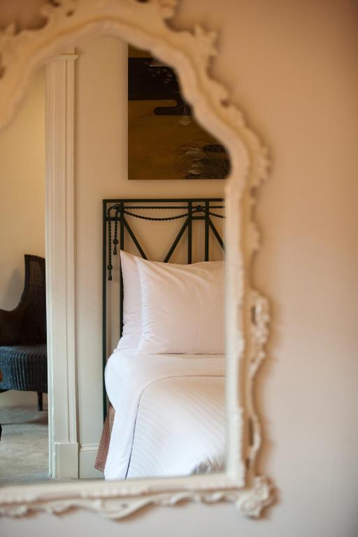 Postel nebo postele na pokoji v ubytování Hotel Lombardy