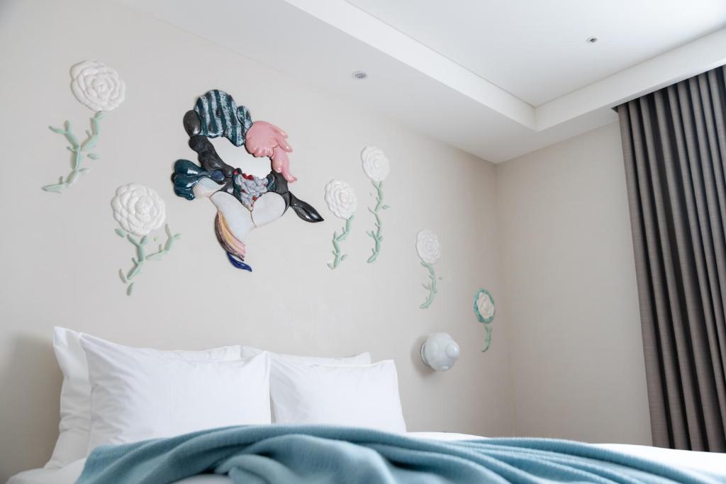 Postel nebo postele na pokoji v ubytování Brio Hotel