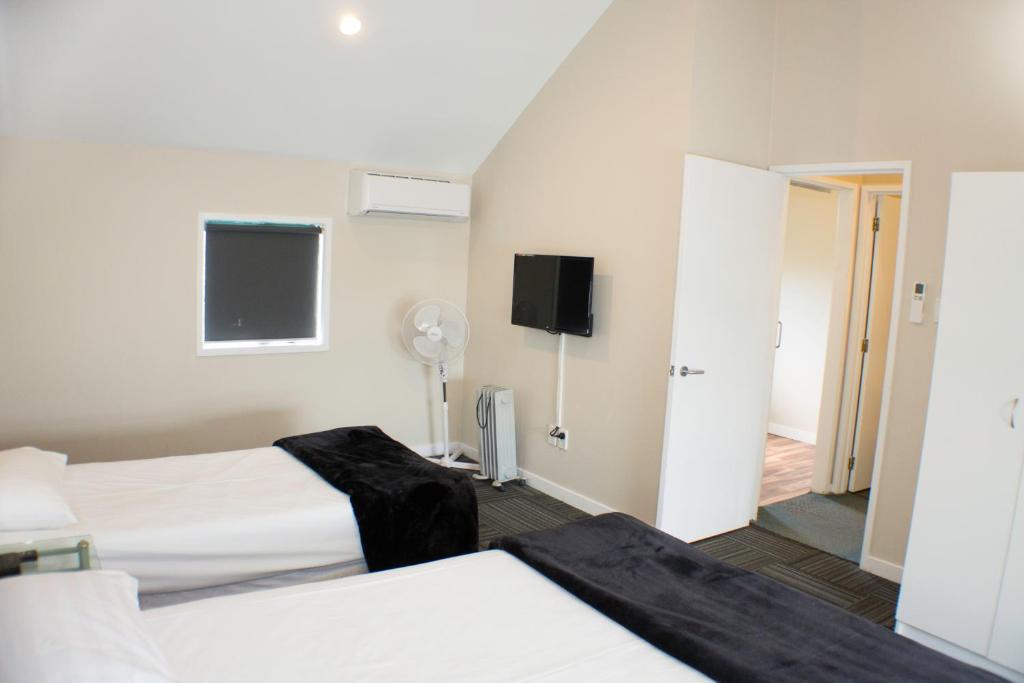 Postel nebo postele na pokoji v ubytování Rayland Motel