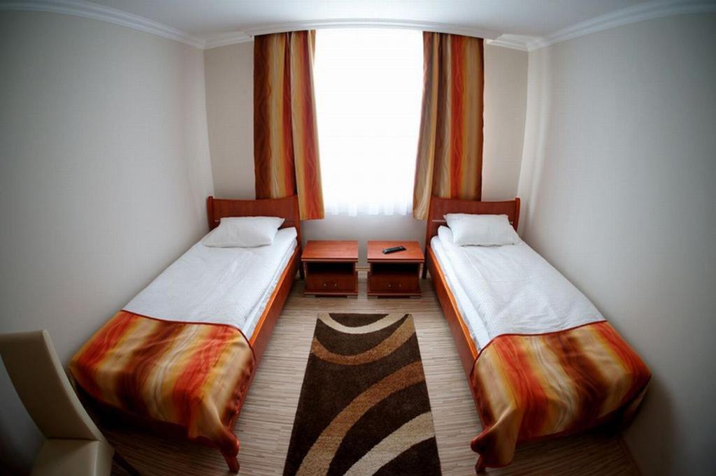 Posteľ alebo postele v izbe v ubytovaní Borka Apartman
