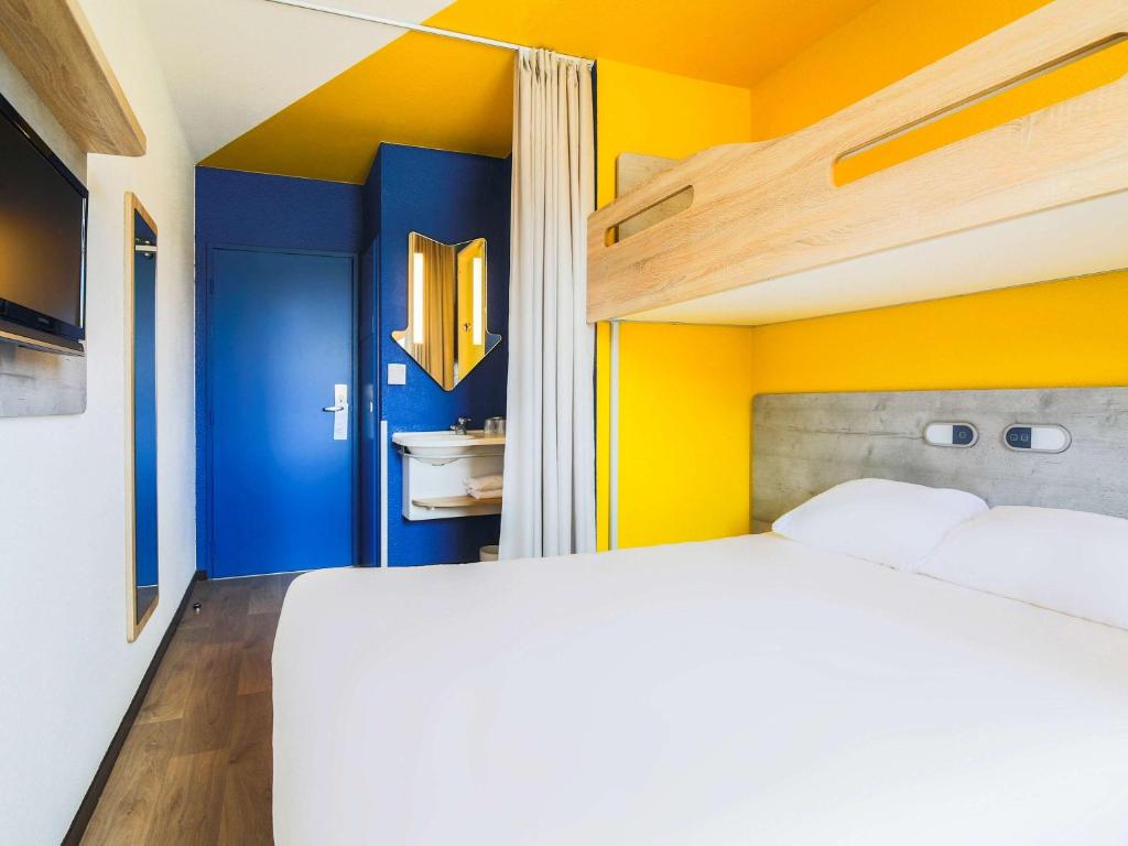 Llit o llits en una habitació de Ibis Budget Albi Centre