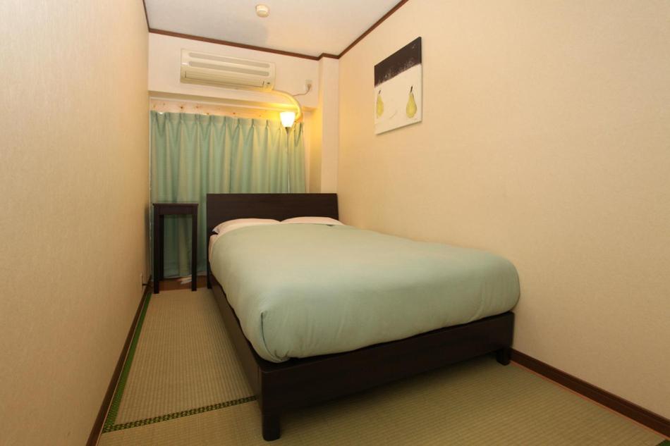 Postel nebo postele na pokoji v ubytování Hostel Zen