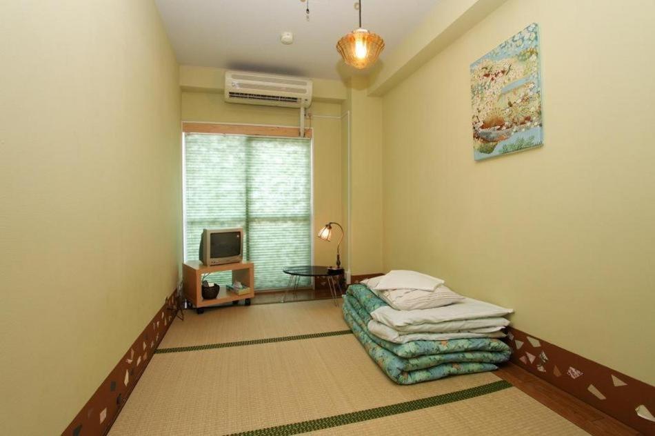 Postel nebo postele na pokoji v ubytování Hostel Zen