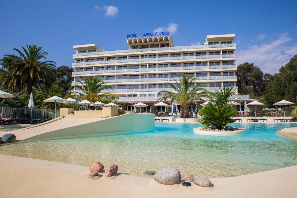 a hotel with a swimming pool and a resort at Hôtel Campo Dell'oro in Ajaccio