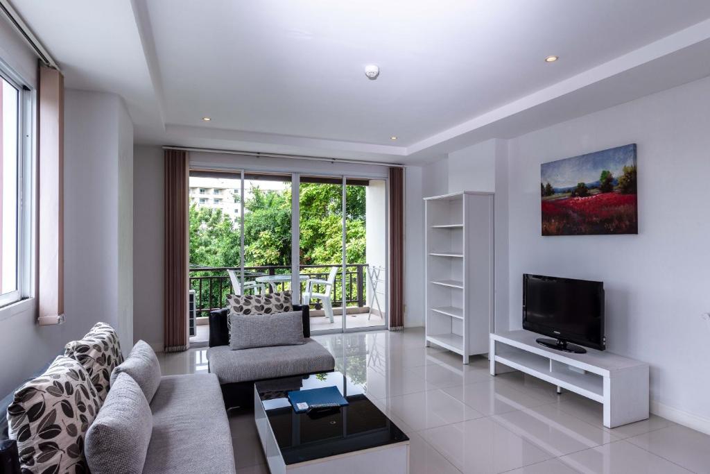 TV a/nebo společenská místnost v ubytování Jomtien Beach Penthouses