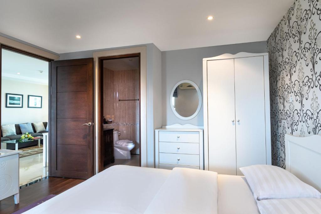 Postel nebo postele na pokoji v ubytování Jomtien Beach Penthouses