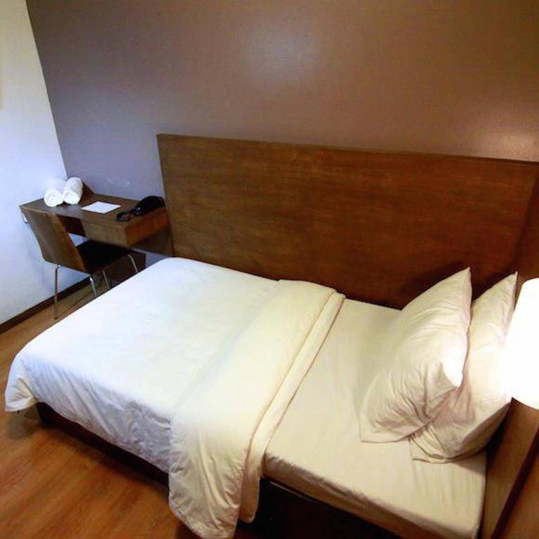 Postel nebo postele na pokoji v ubytování Hotel Durban