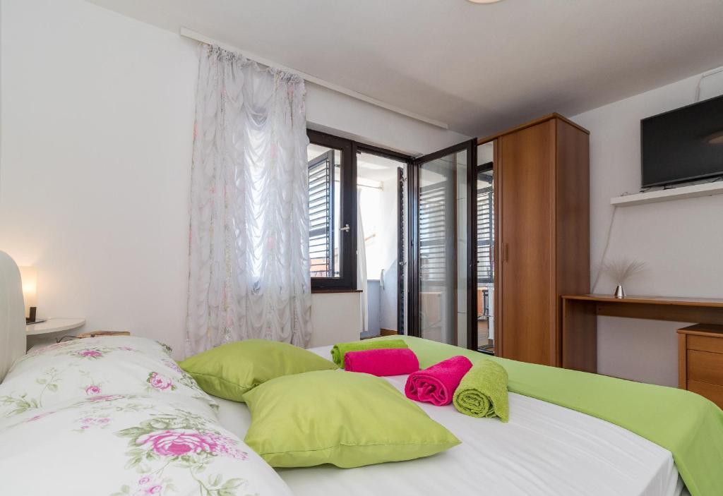 Postel nebo postele na pokoji v ubytování Guesthouse Adria