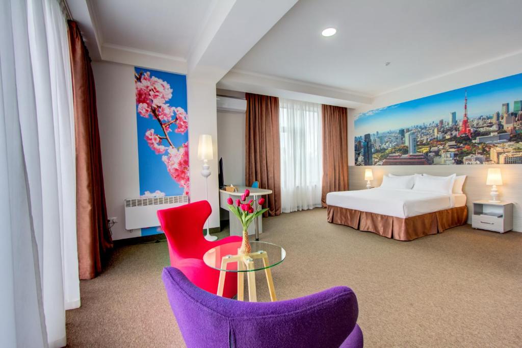 Postel nebo postele na pokoji v ubytování Hotel Bridges Bishkek