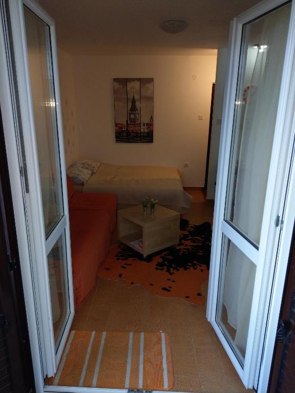 Postel nebo postele na pokoji v ubytování AS Apartments Risan