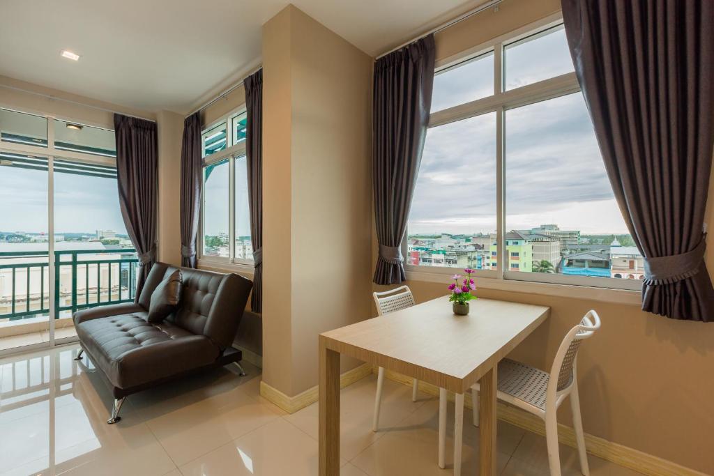 Posezení v ubytování Evergreen Suite Hotel