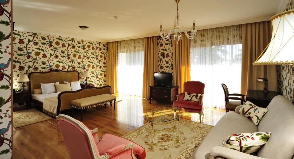 Postel nebo postele na pokoji v ubytování Villa Augusto Boutique Hotel & SPA