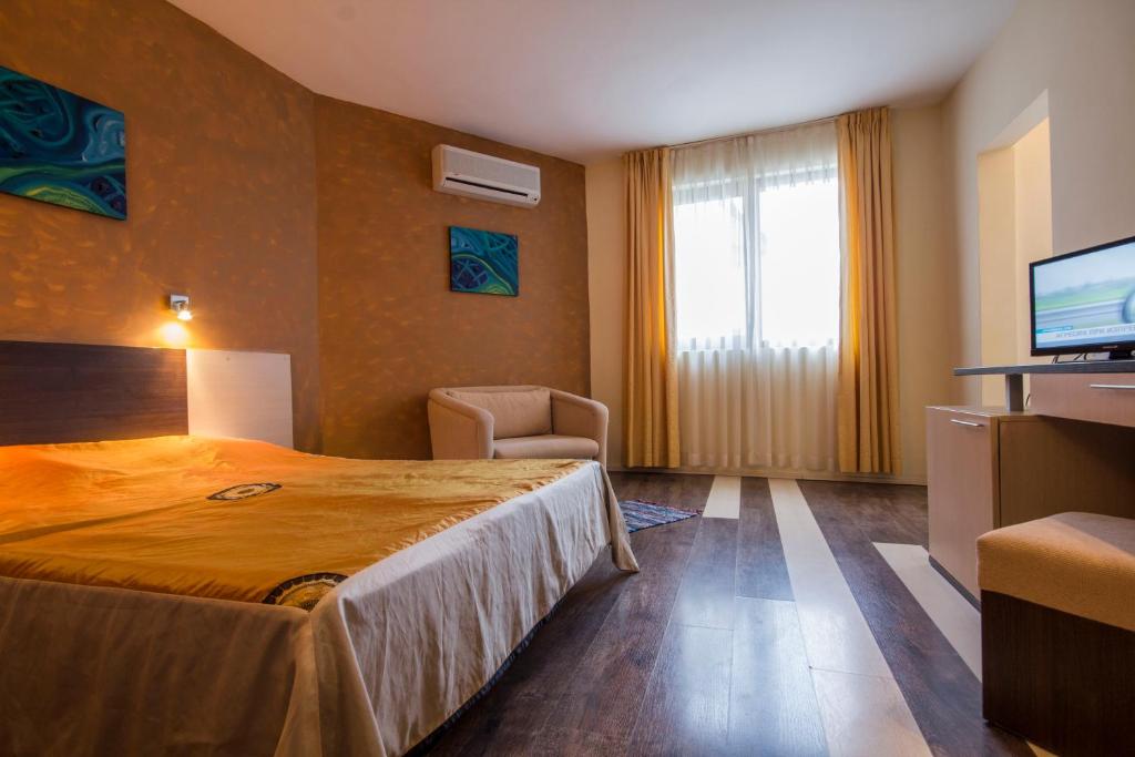 Postel nebo postele na pokoji v ubytování Coral Guest House