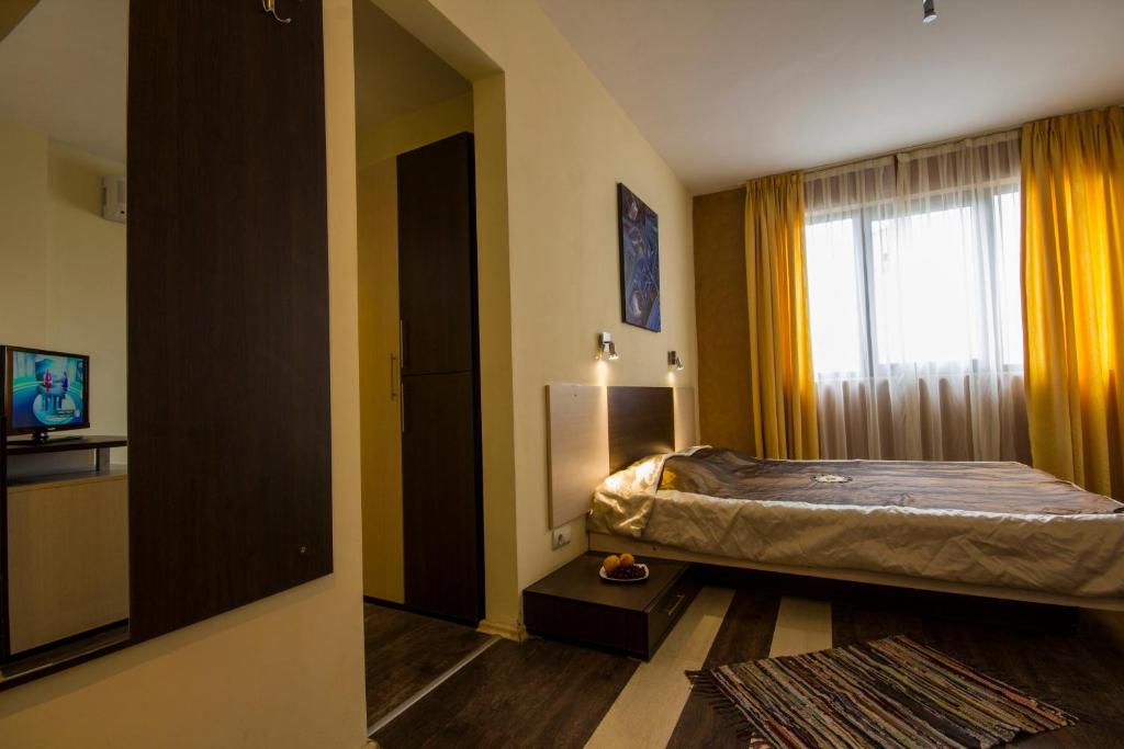 Postel nebo postele na pokoji v ubytování Coral Guest House