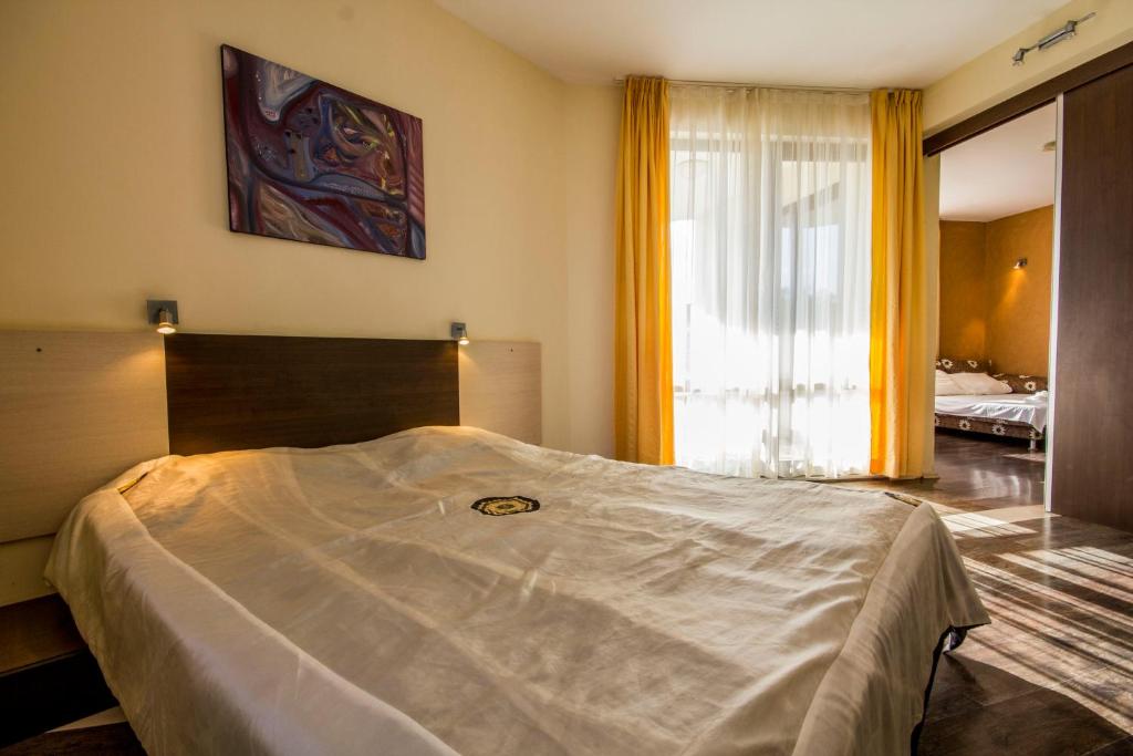 Postel nebo postele na pokoji v ubytování Coral Guest House