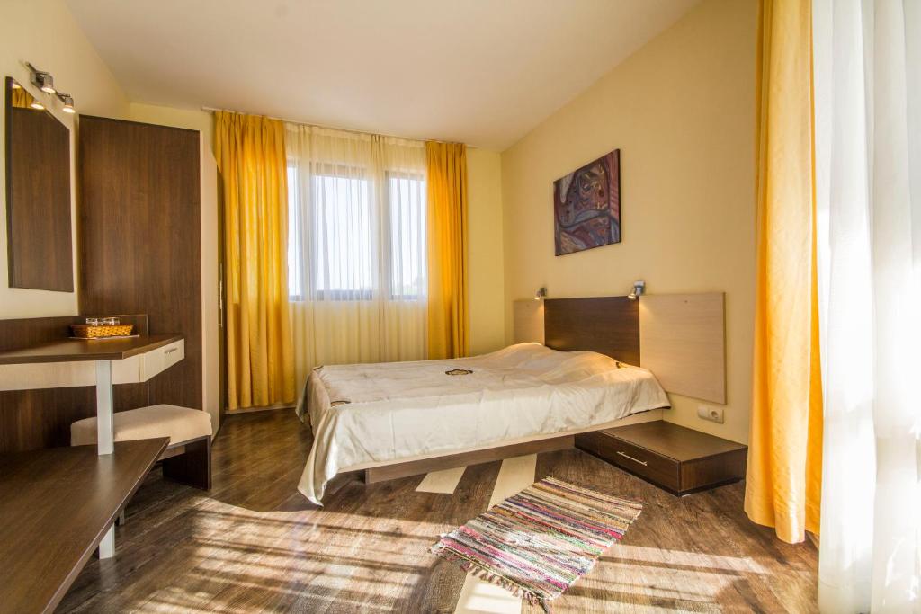 Postel nebo postele na pokoji v ubytování Coral Guest House