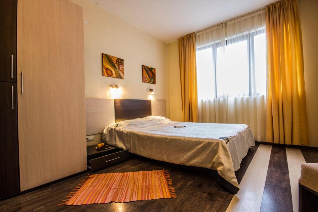 Postel nebo postele na pokoji v ubytování Coral Guest House