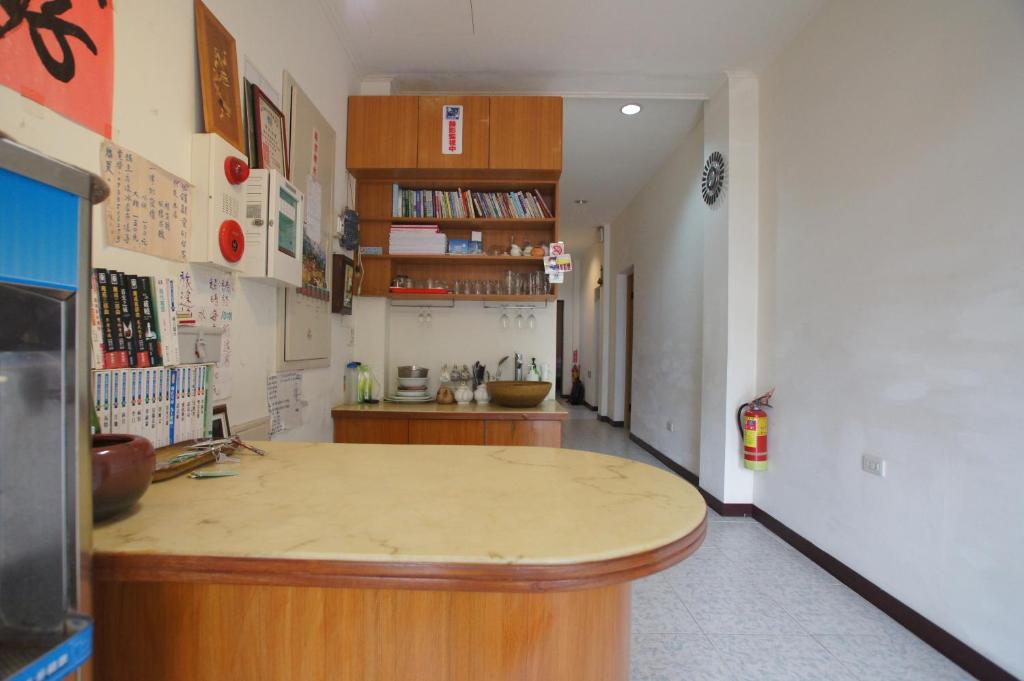 Kuchyň nebo kuchyňský kout v ubytování Music House Homestay