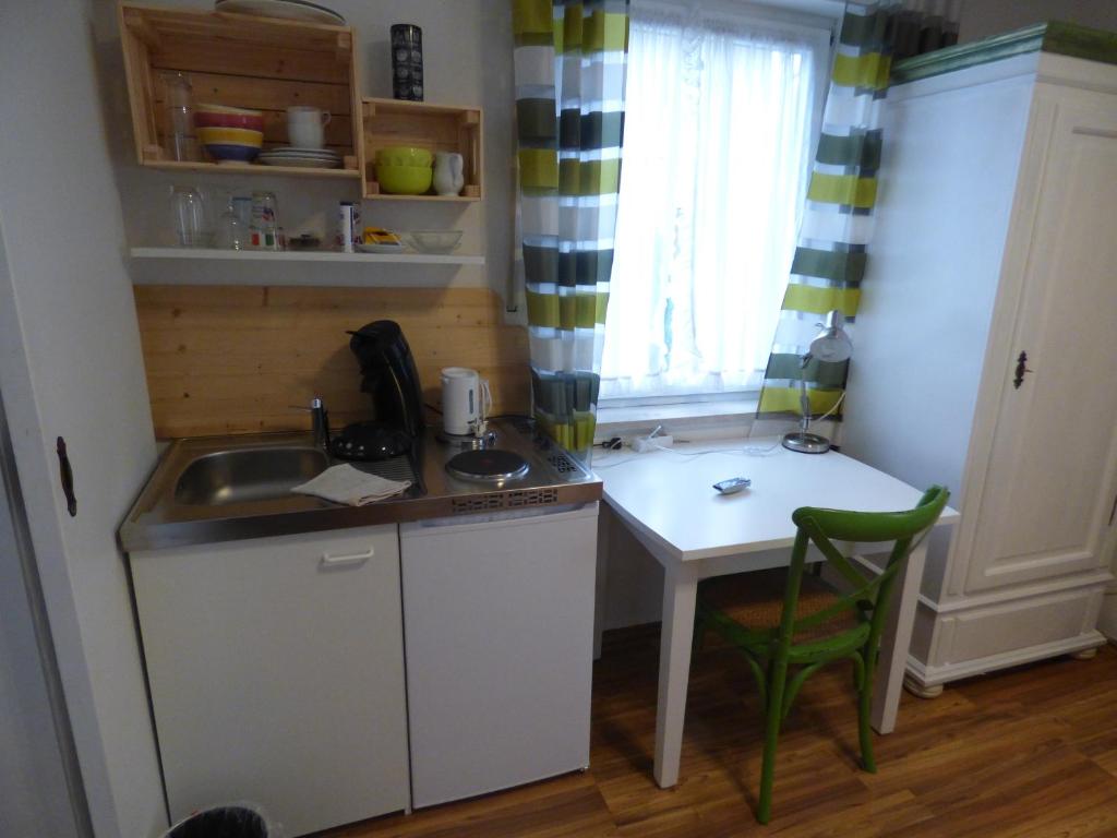 Kuchyň nebo kuchyňský kout v ubytování Hotel Engelhof