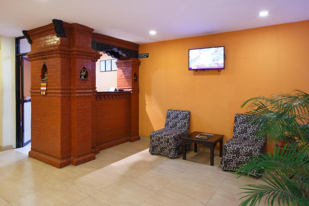 TV a/nebo společenská místnost v ubytování Hotel Serenity