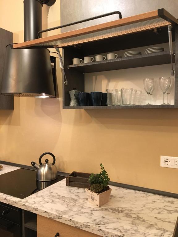 A kitchen or kitchenette at Dimora Orfeo