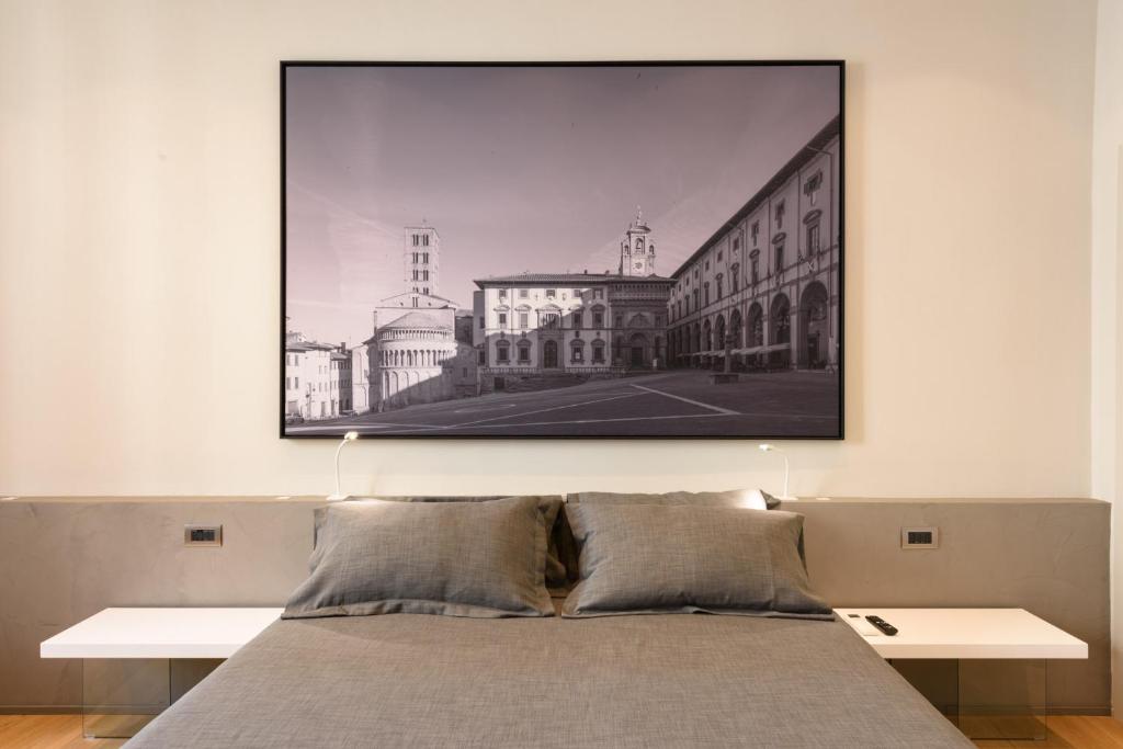 Palazzo Vasarri - Luxury design suitesにあるベッド
