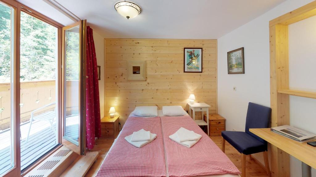 Postel nebo postele na pokoji v ubytování Alpengasthof Paletti