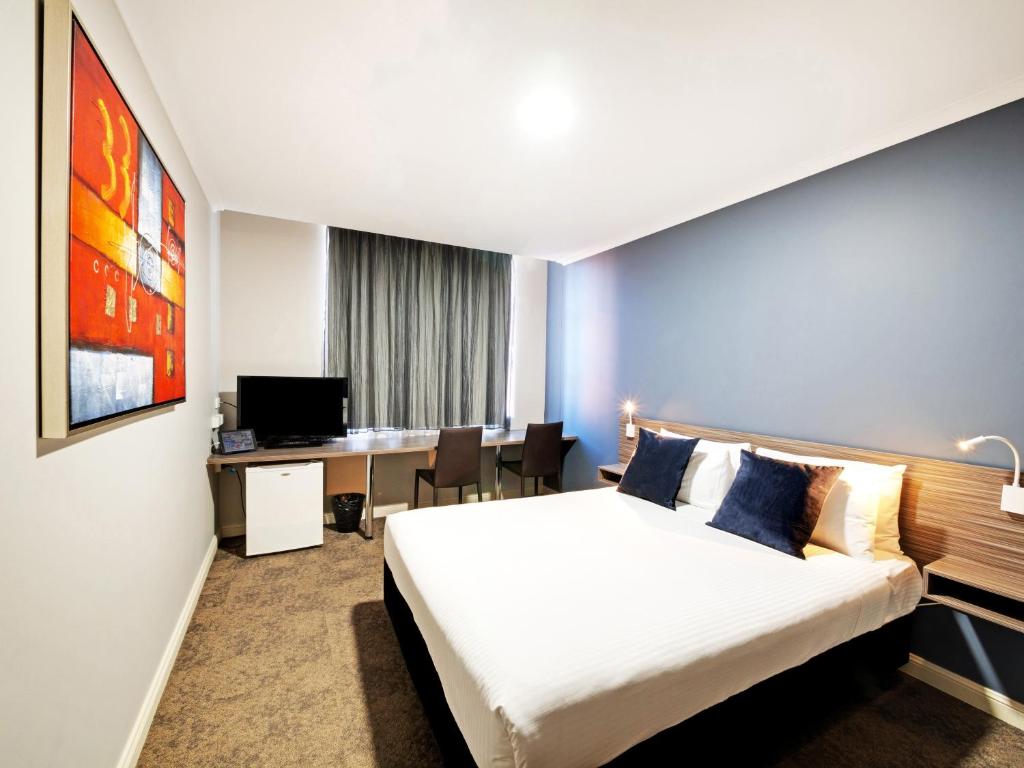 TV a/nebo společenská místnost v ubytování 28 Hotel